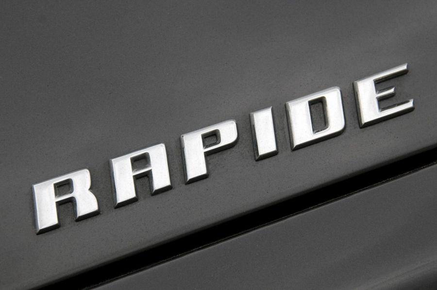 Логотип Aston Martin Rapide 2010 года  (NA) (фото 50 из 57)